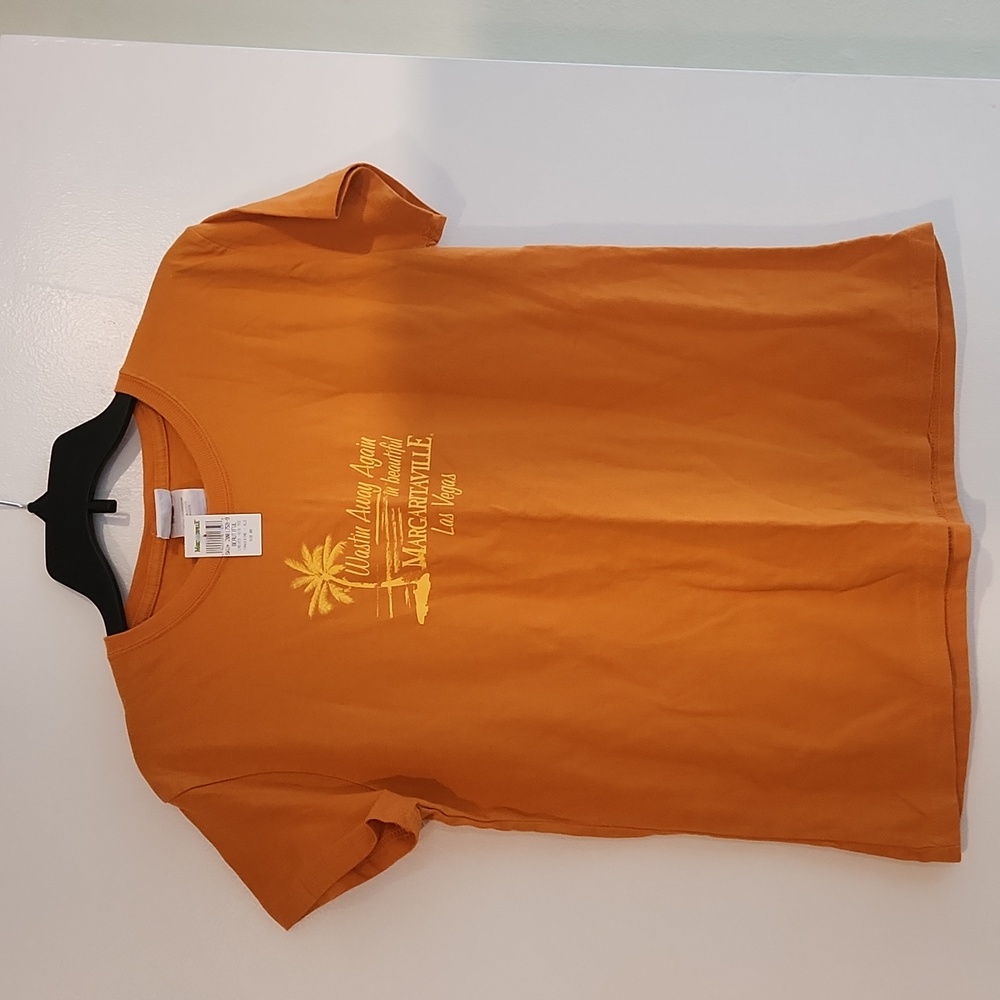 Ladies Margaritaville xlg(runs small) short sleeve orange tshirt.  Las Vegas